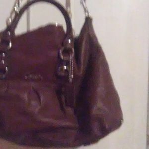 Brown leather coach handbag